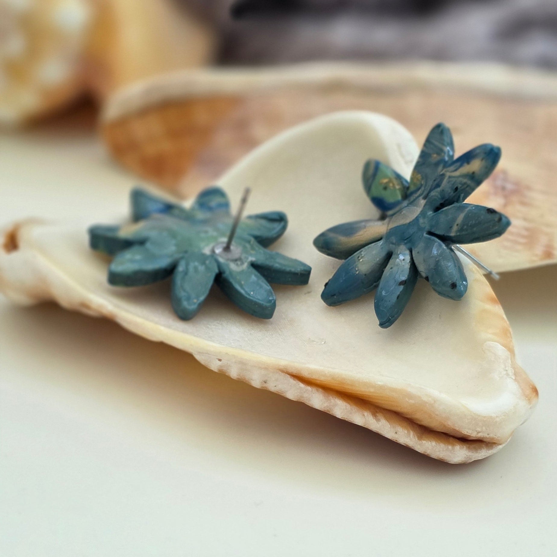 aretes hechos a mano
aretes artesanales
aretes florales
aretes marmoleados
stud earrings handmade
marbled earrings
handmade flower earrings
blue earrings
aretes azules
ocean-inspired jewelry
coastal jewelry
beach-inspired earrings
boho earrings
organic jewelry
unique handmade earrings
lightweight earrings
artisan jewelry
handmade jewelry Puerto Rico
Blessed Knots
limited edition jewelry