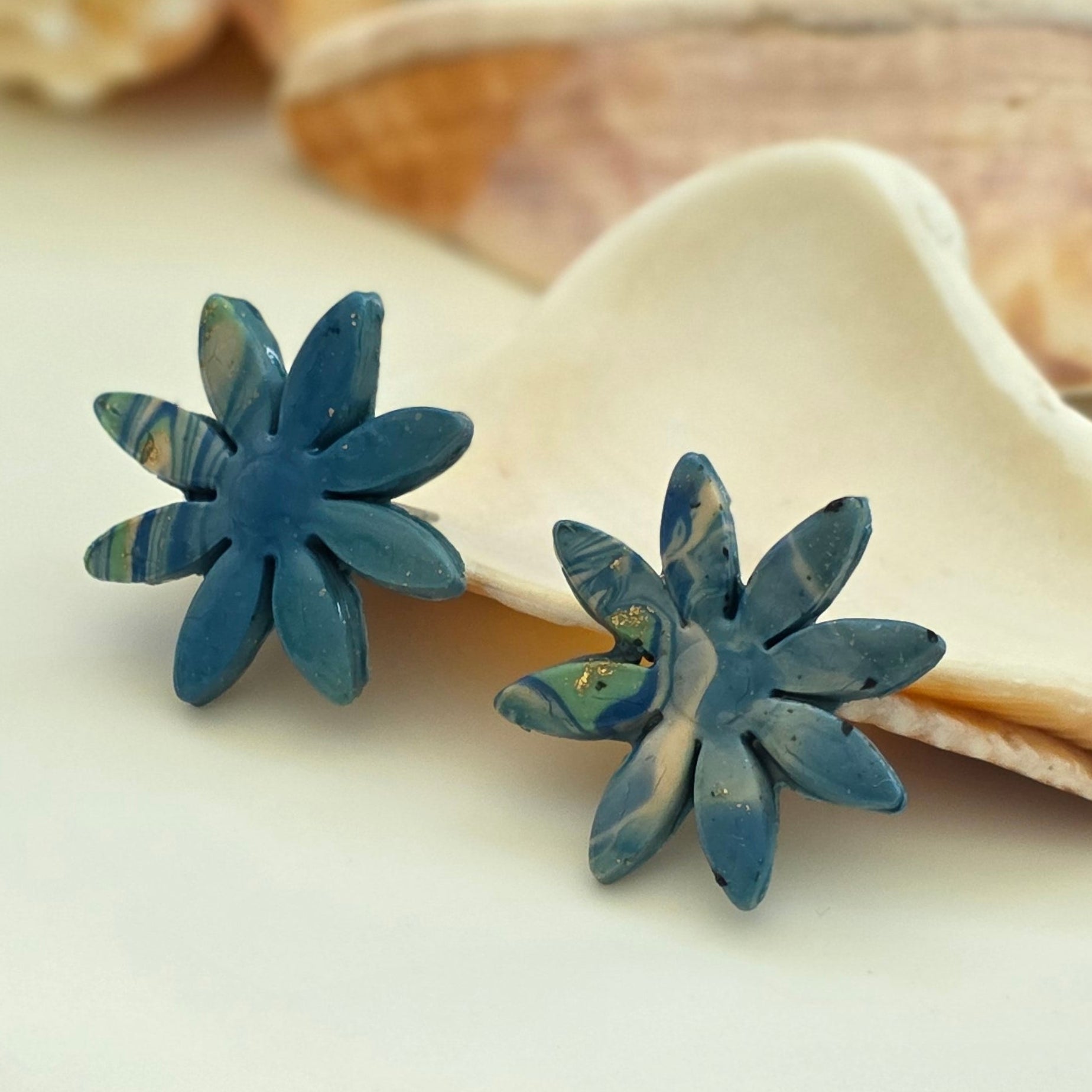 aretes hechos a mano
aretes artesanales
aretes florales
aretes marmoleados
stud earrings handmade
marbled earrings
handmade flower earrings
blue earrings
aretes azules
ocean-inspired jewelry
coastal jewelry
beach-inspired earrings
boho earrings
organic jewelry
unique handmade earrings
lightweight earrings
artisan jewelry
handmade jewelry Puerto Rico
Blessed Knots
limited edition jewelry