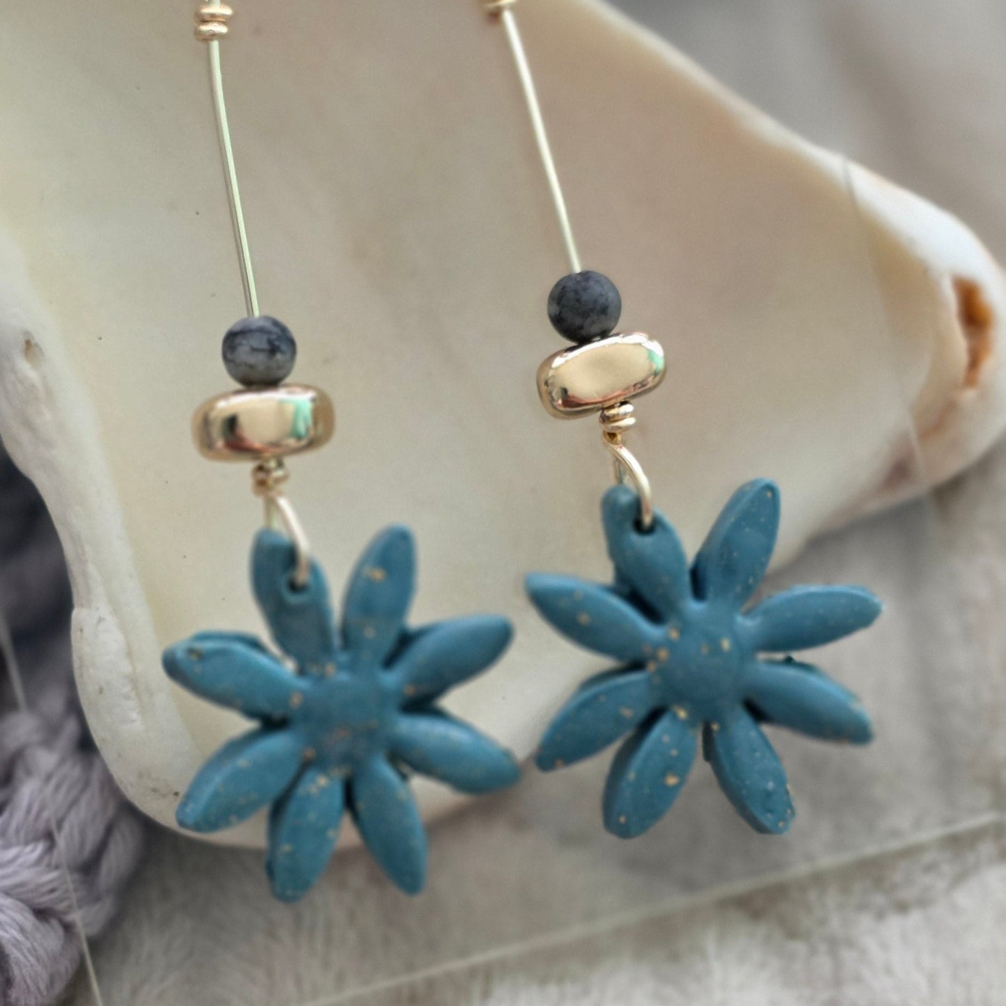 polymer clay earrings, handmade earrings, floral earrings, blue earrings, artisan jewelry, statement earrings, dangle earrings, unique earrings, boho earrings, lightweight earrings, handcrafted jewelry, modern earrings, flower earrings