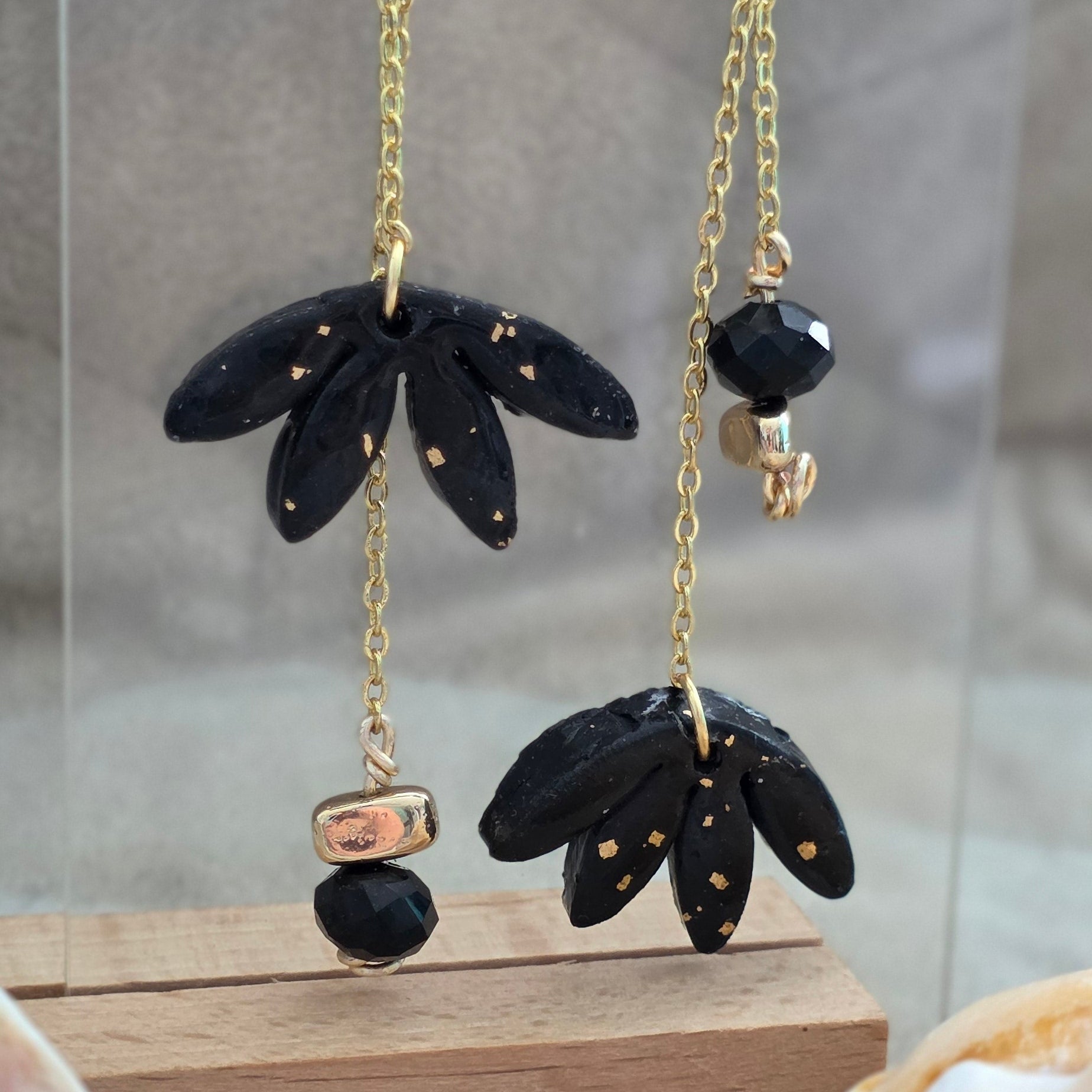 black earrings, polymer clay earrings, handmade earrings, statement earrings, gold detail earrings, dangle earrings, elegant earrings, artisan jewelry, unique earrings, boho earrings, long chain earrings, handcrafted jewelry, modern earrings