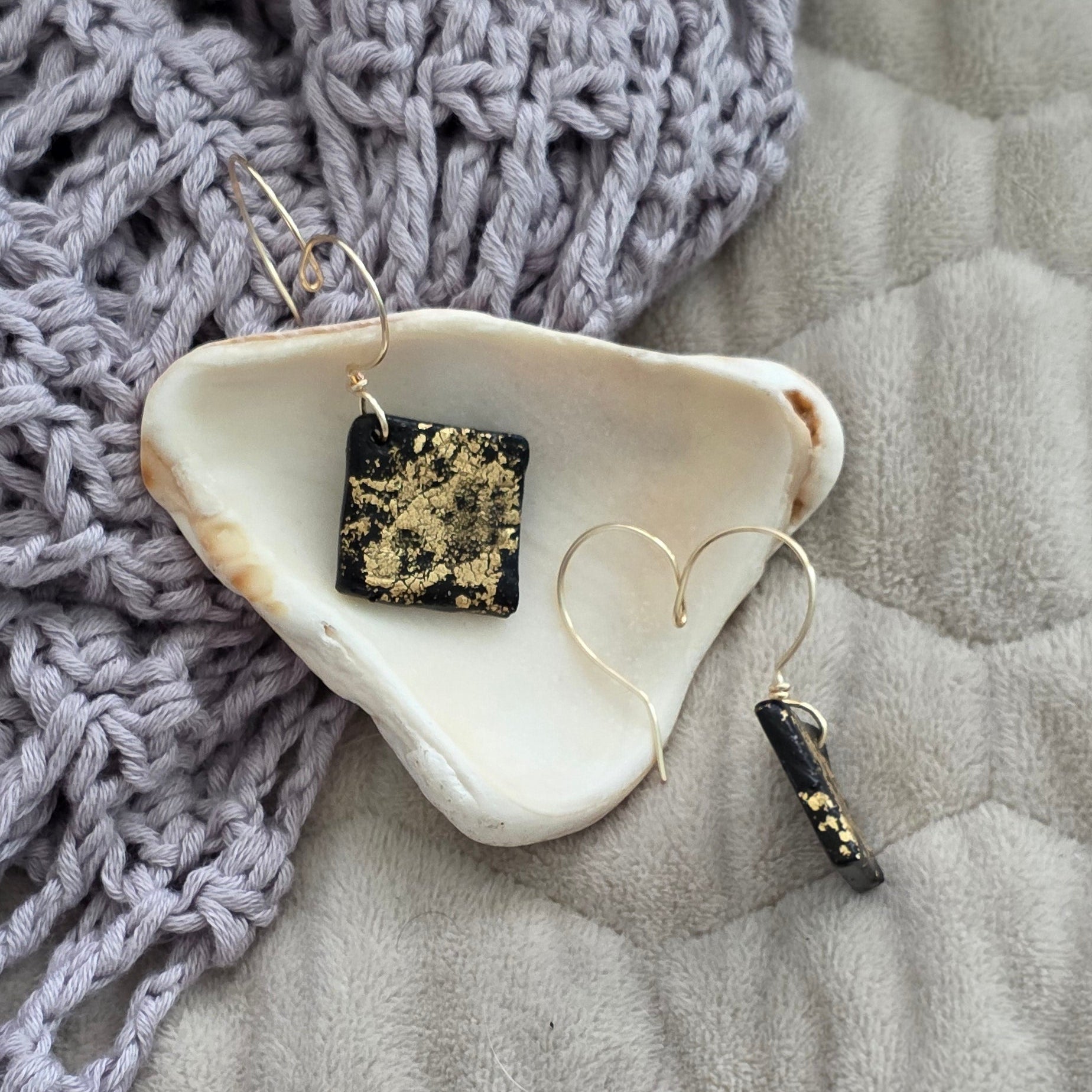 polymer clay earrings, black earrings, gold earrings, geometric earrings, handmade earrings, artisan jewelry, statement earrings, modern earrings, minimalist jewelry, dangle earrings, elegant earrings, unique earrings